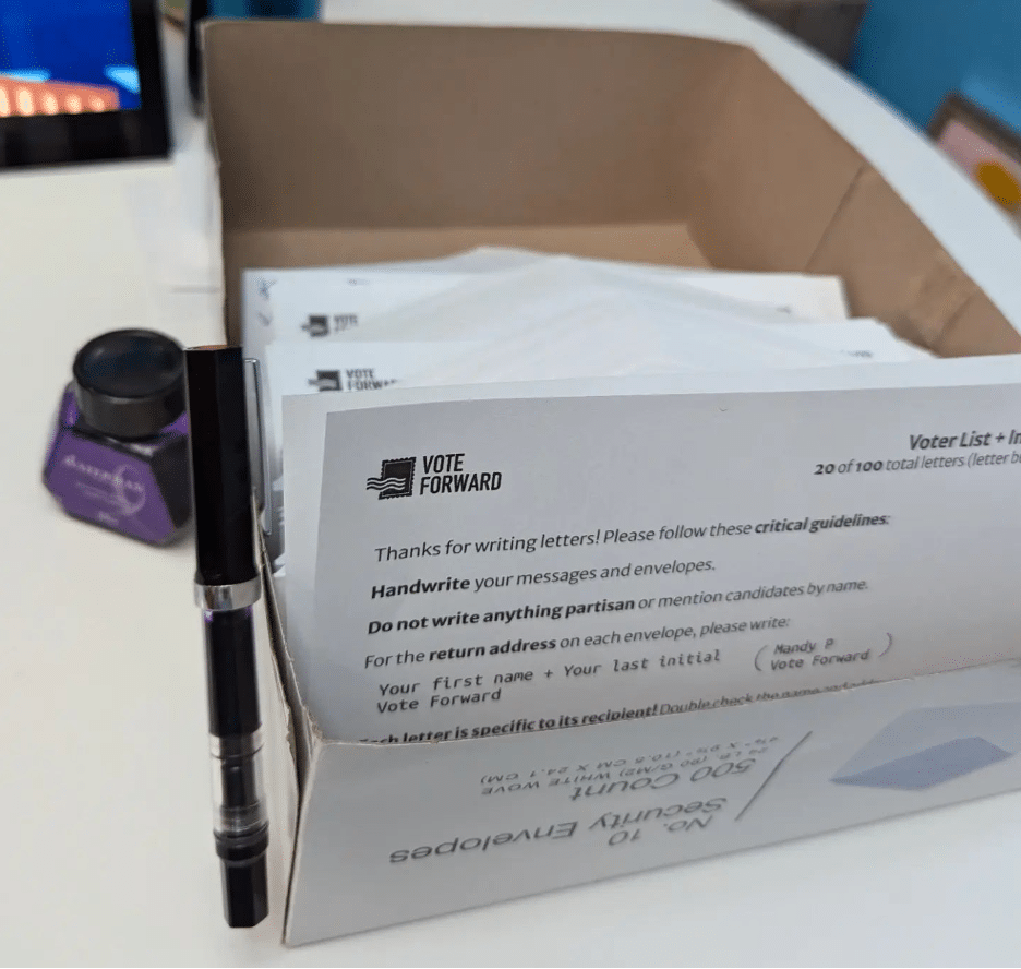 A box of Vote Forward letters to be personalized by volunteers for voters.